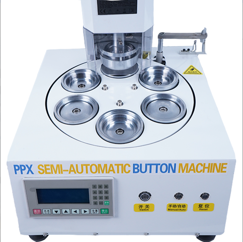 PPX Electric Automatic Button Making Machine.High speed, high volume production in 30 different sizes.