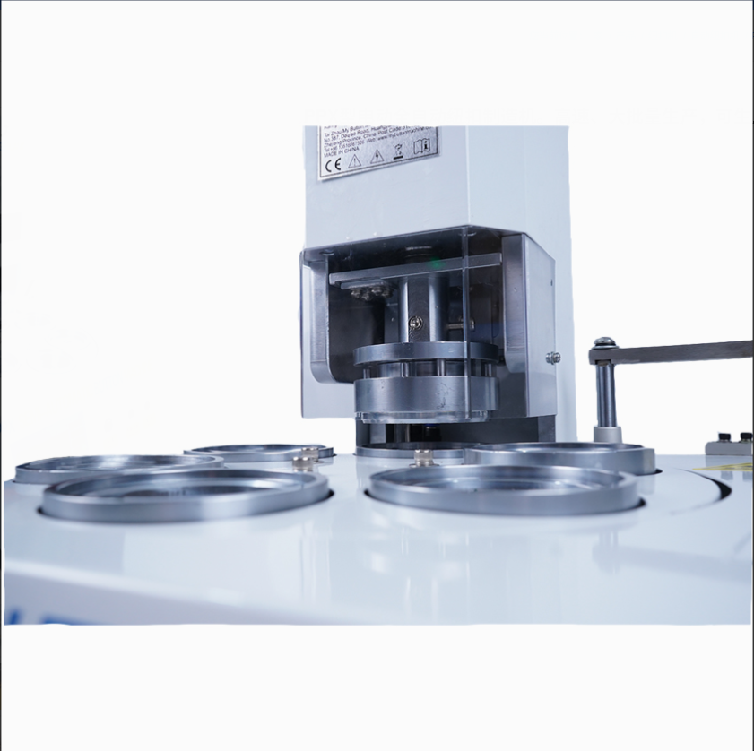 PPX Electric Automatic Button Making Machine.High speed, high volume production in 30 different sizes.